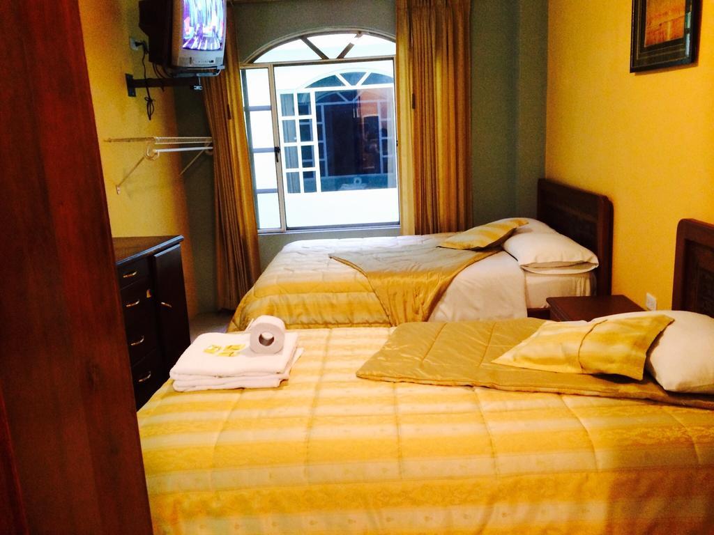 Hostal Grand Rio Baños Habitación foto